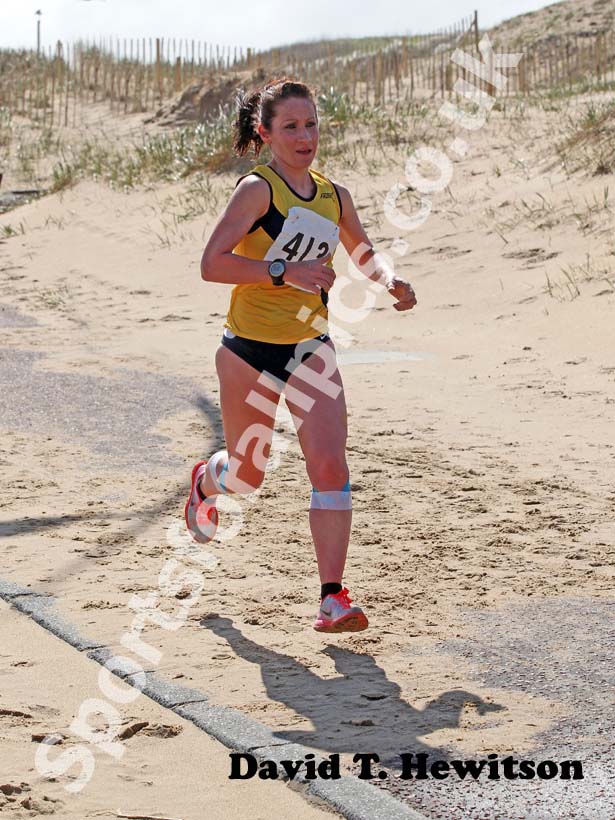 Claire Simpson (Jarrow and Hebburn AC) on her way to winning the South Shields 10k Sand Dance Race.